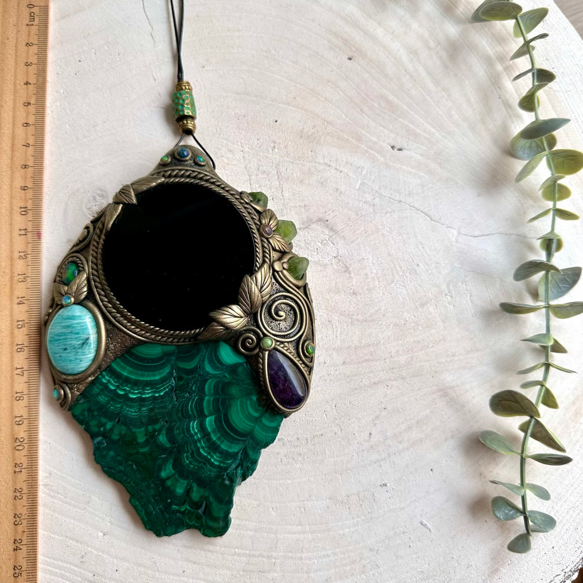 Handmade natural Malachite wall hanging with a Black Obsidian mirror, Amazonite, Amethyst, Peridot and Black Ethiopian Opal.