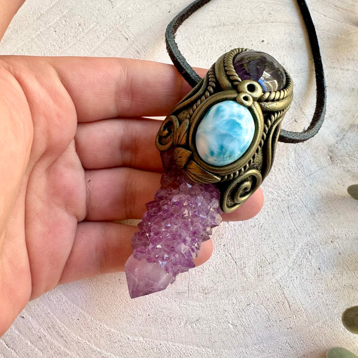One of a kind crystal pendant with a sparkling Spirit Quartz cluster, blue Larimar and purple Amethyst.