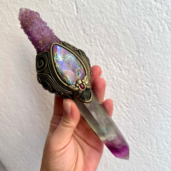 Handmade Rainbow Fluorite crystal wand featuring Deep Purple Spirit Quartz, Labradorite, Moldavite, Amethyst and Rhodolite Garnet, a one of a kind energy healing and ritual tool designed for clarity, intuition, spiritual awakening, protection and personal transformation.