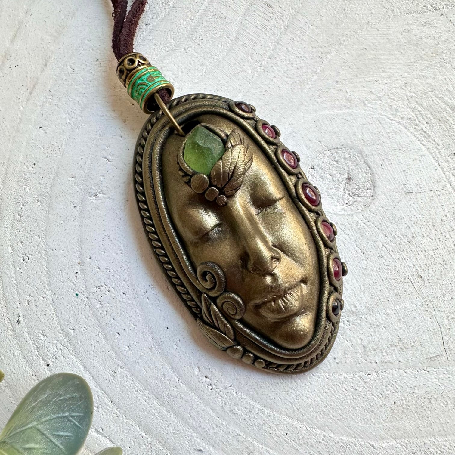 Healing crystal jewelry with Peridot and Rhodolite Garnet in an artisan Goddess design.