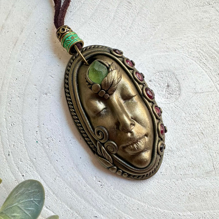 Healing crystal jewelry with Peridot and Rhodolite Garnet in an artisan Goddess design.