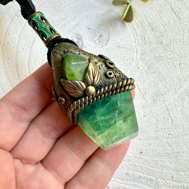 Unique crystal necklace featuring translucent Green Fluorite and a vibrant Peridot gemstone.