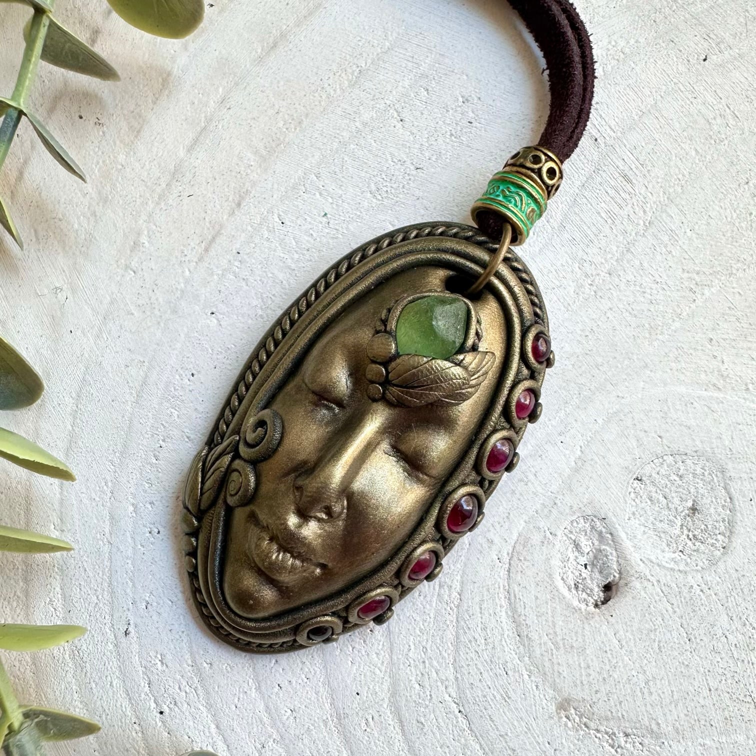 Handmade crystal jewelry with Peridot and Rhodolite Garnet in a feminine Goddess-inspired design.