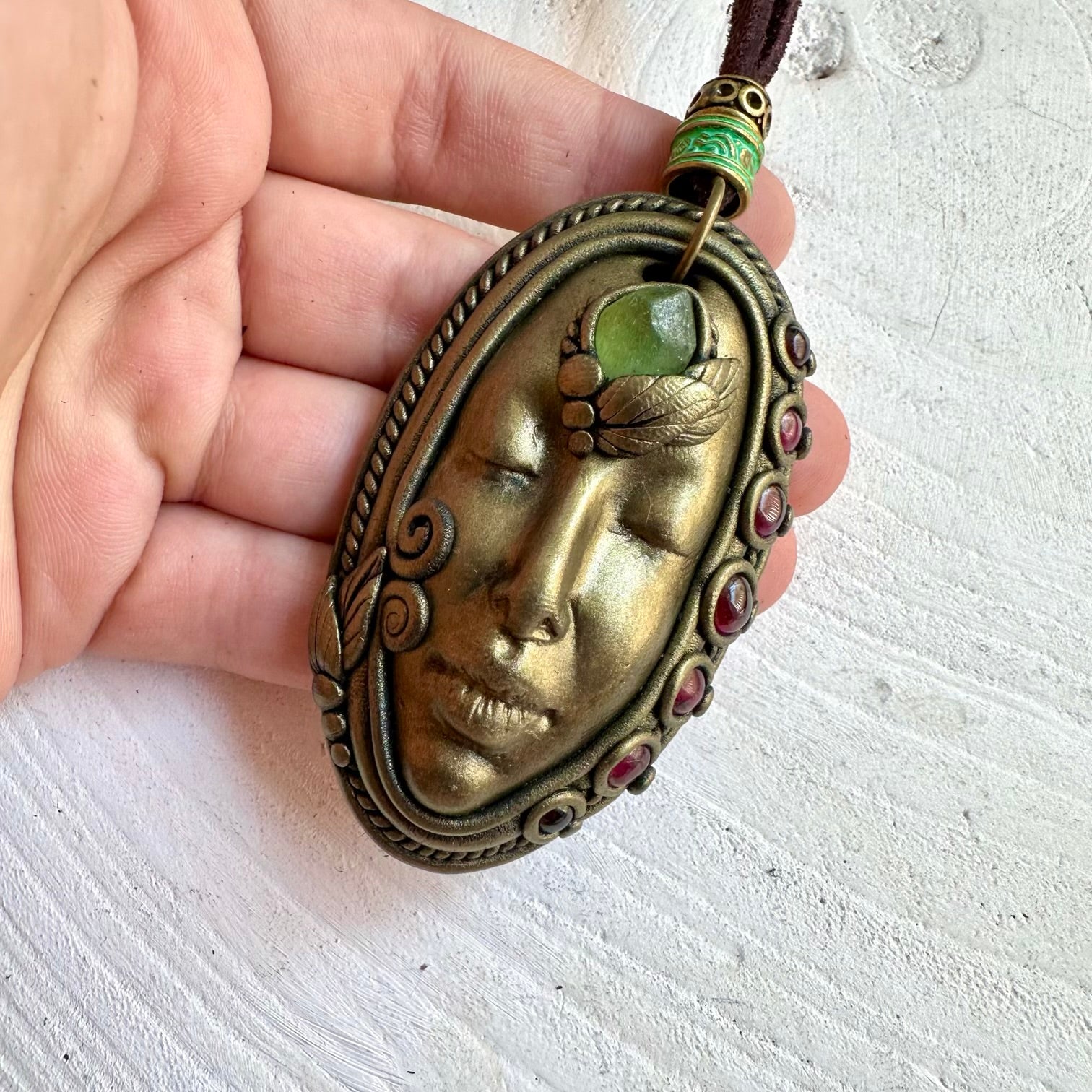 Handmade Goddess pendant with Peridot and Rhodolite Garnet natural gemstone details.