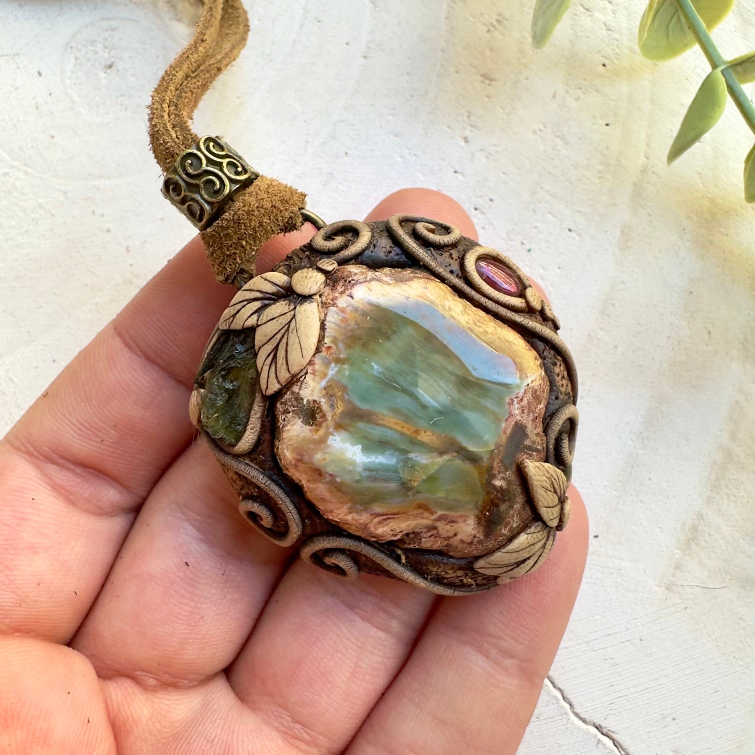 Petrified wood necklace with moldavite and rhodolite garnet gemstones