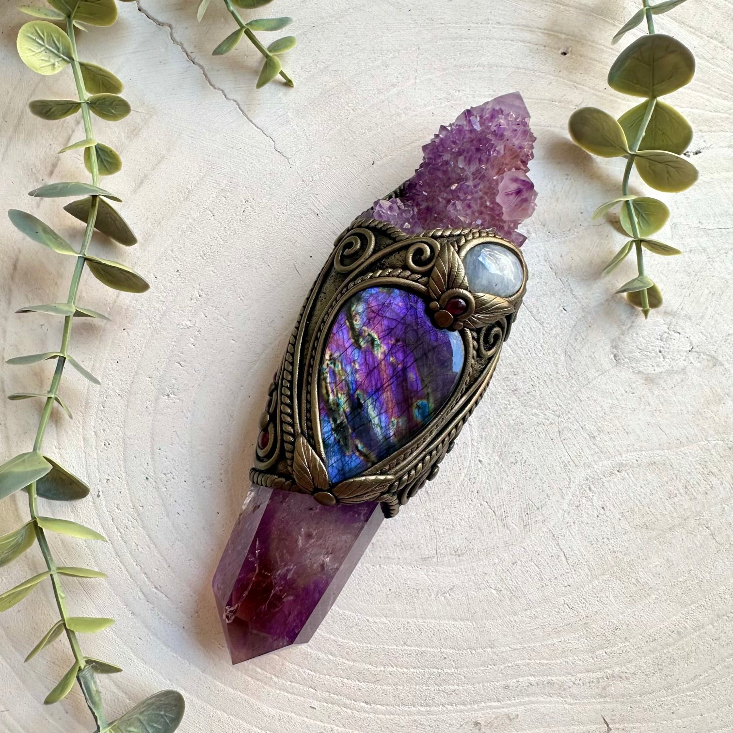 Handmade healing crystal wand featuring a polished Ametrine point, Deep Purple Spirit Quartz, Purple Labradorite, Moonstone and Rhodolite Garnet, a one of a kind energy healing and ritual tool.