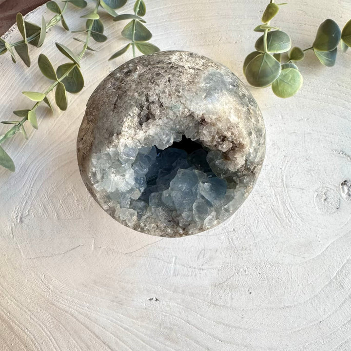 Blue celestite mineral sphere specimen
