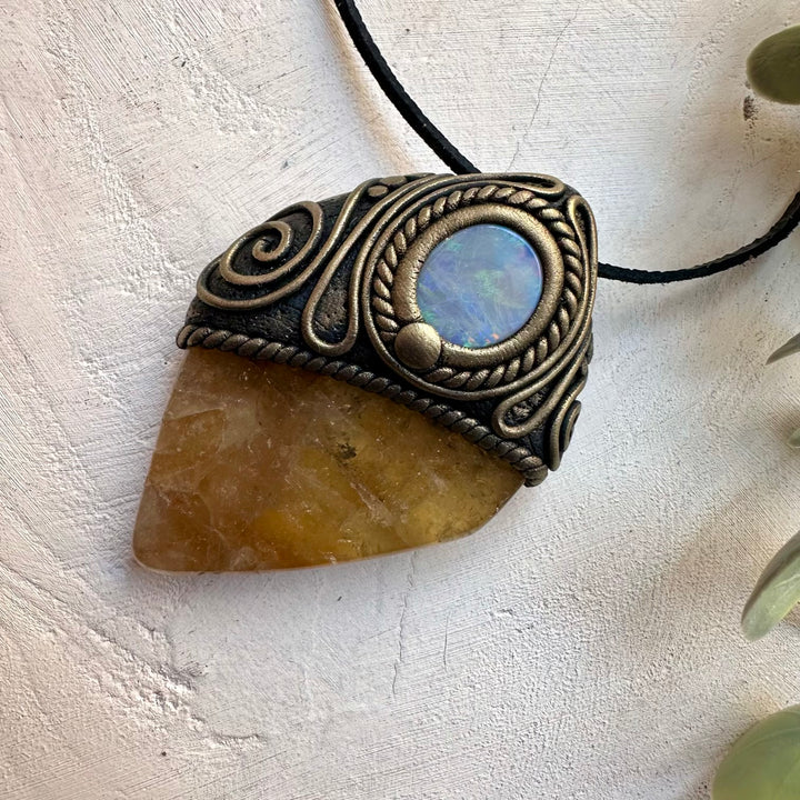 Polished citrine gemstone paired with  Australian opal in a handmade pendant