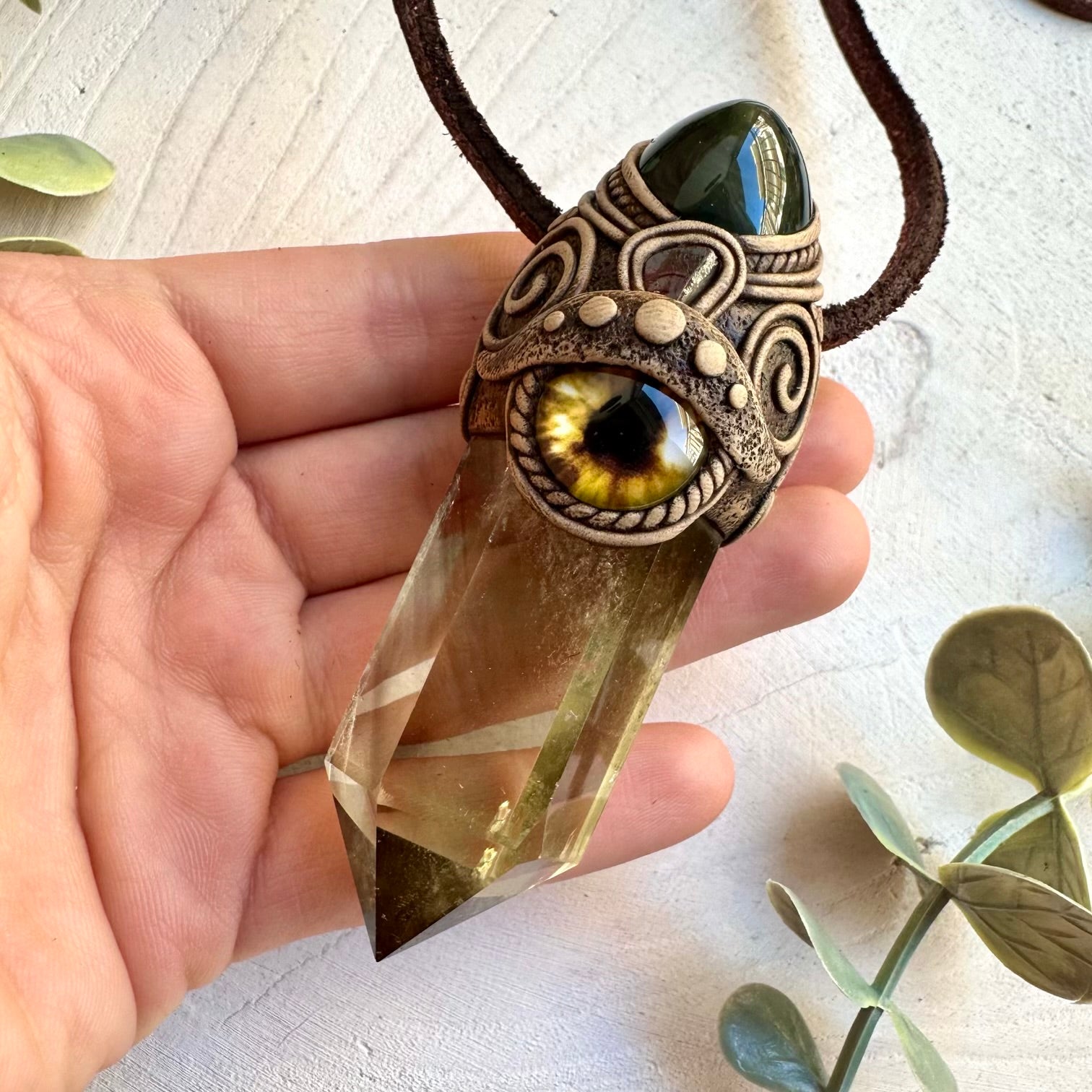 Polished citrine with rainbow obsidian red garnet and eye wand pendant