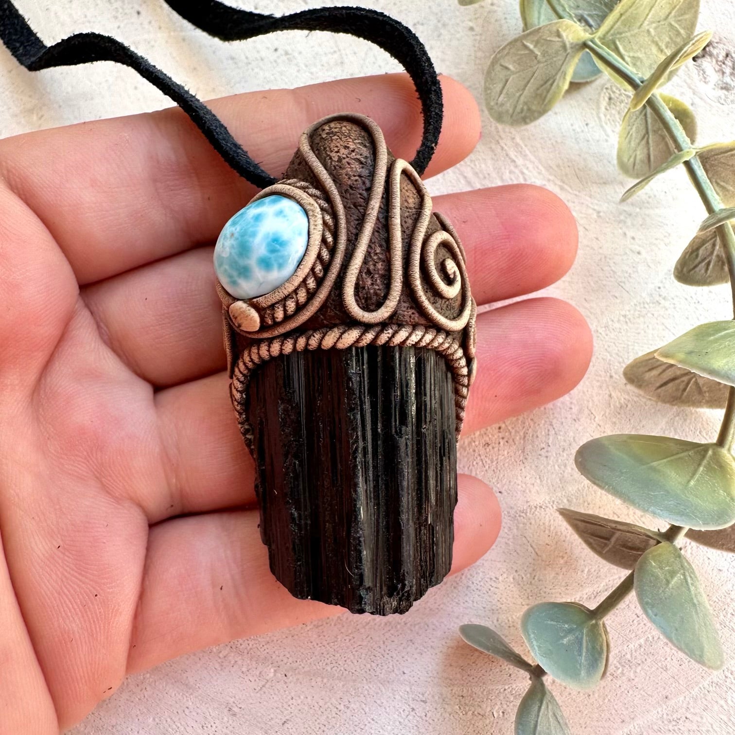 Metaphysical jewelry featuring grounding and ocean energy crystals