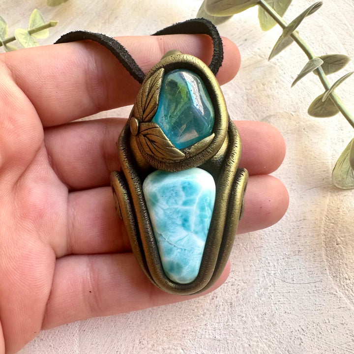 Handmade healing crystal necklace with calming Larimar and radiant Aqua Aura Quartz.