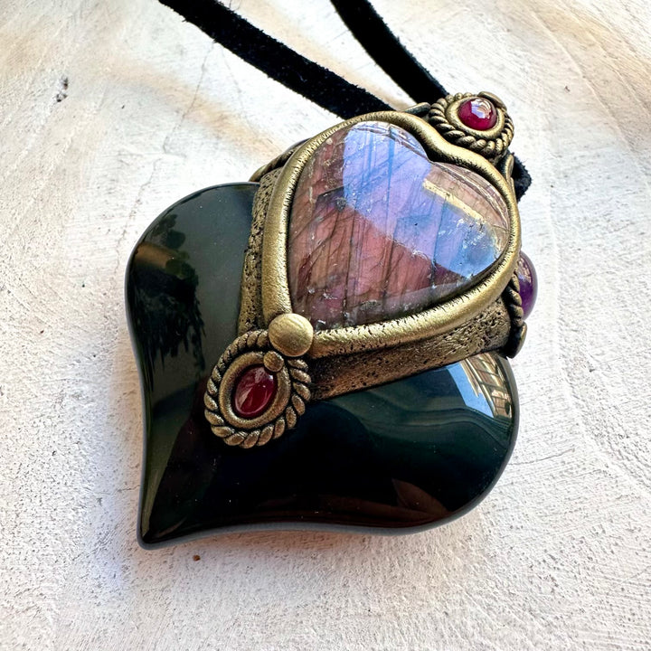 Crystal talisman necklace crafted with Rainbow Obsidian, Purple Labradorite, Amethyst and Garnet.