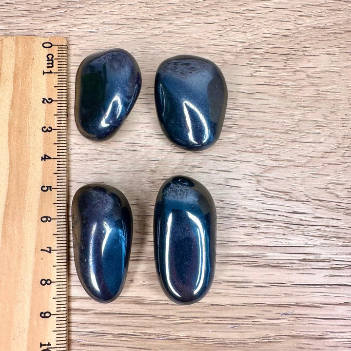 Smooth polished hematite pocket stone