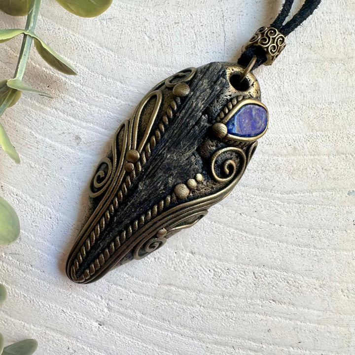 Unique artisan pendant combining Black Kyanite with a beautiful Lapis Lazuli gemstone.