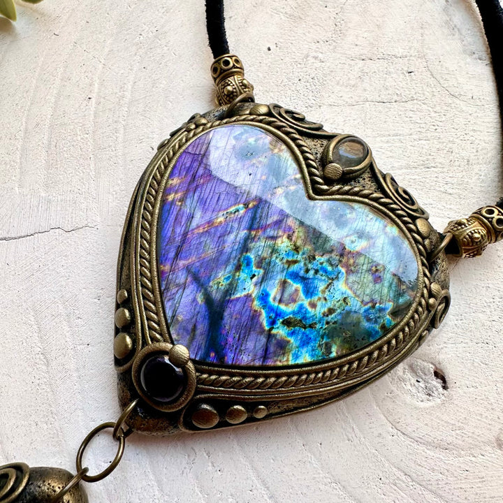 Natural gemstone jewelry showcasing a stunning Purple Labradorite heart with sparkling gemstone accents.