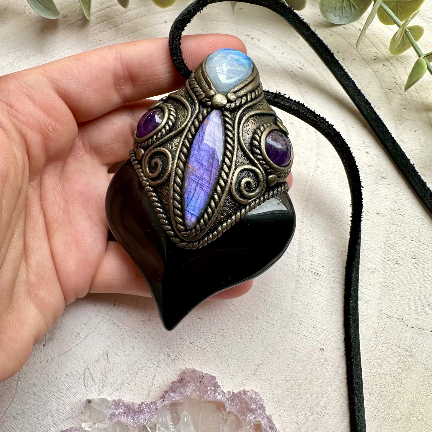 Handmade spiritual jewelry with rainbow obsidian and gemstones