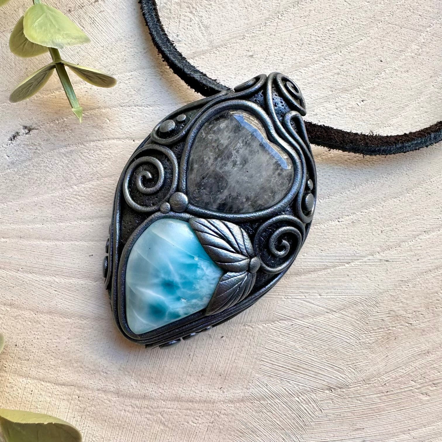 Spiritual jewelry combining larimar and quartz heart