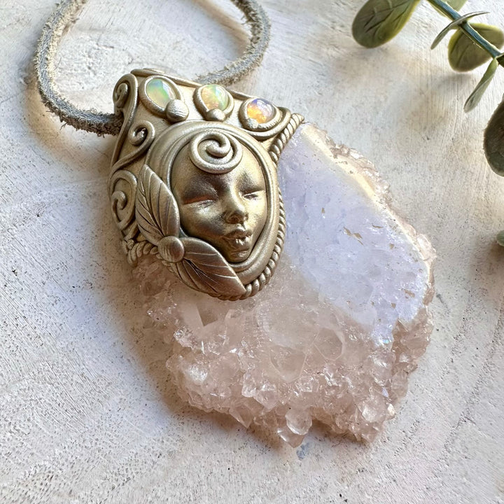 Handmade metaphysical jewelry showcasing natural Quartz Stalactite and colorful Ethiopian Opal.