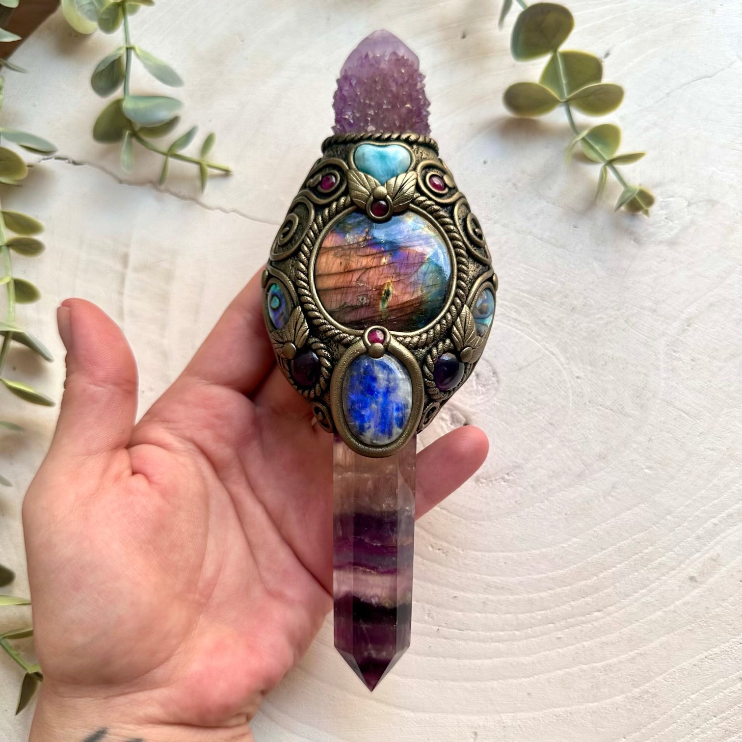Handmade Rainbow Fluorite crystal wand featuring Spirit Quartz, Labradorite, Moonstone, Larimar Heart, Amethyst, Abalone Seashell and Rhodolite Garnet, a one of a kind healing crystal tool designed for clarity, intuition, emotional balance, spiritual growth and transformation.