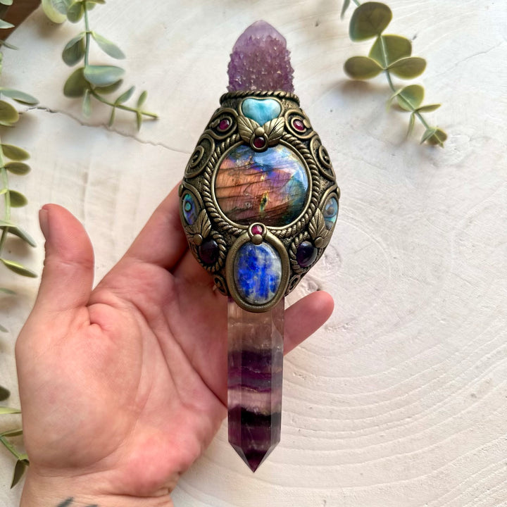 Handmade Rainbow Fluorite crystal wand featuring Spirit Quartz, Labradorite, Moonstone, Larimar Heart, Amethyst, Abalone Seashell and Rhodolite Garnet, a one of a kind healing crystal tool designed for clarity, intuition, emotional balance, spiritual growth and transformation.