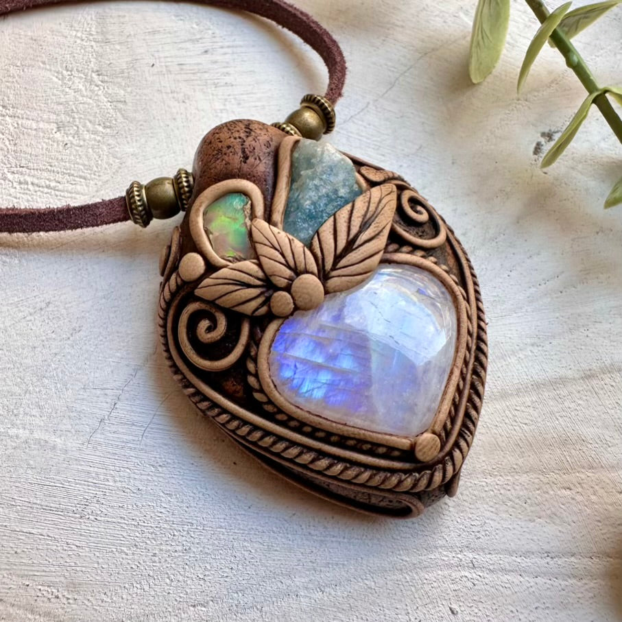 Healing gemstone necklace combining rainbow moonstone raw aquamarine and opal