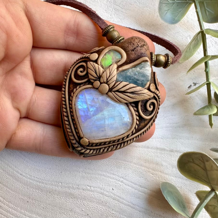 Unique gemstone necklace with rainbow moonstone aquamarine and Ethiopian opal