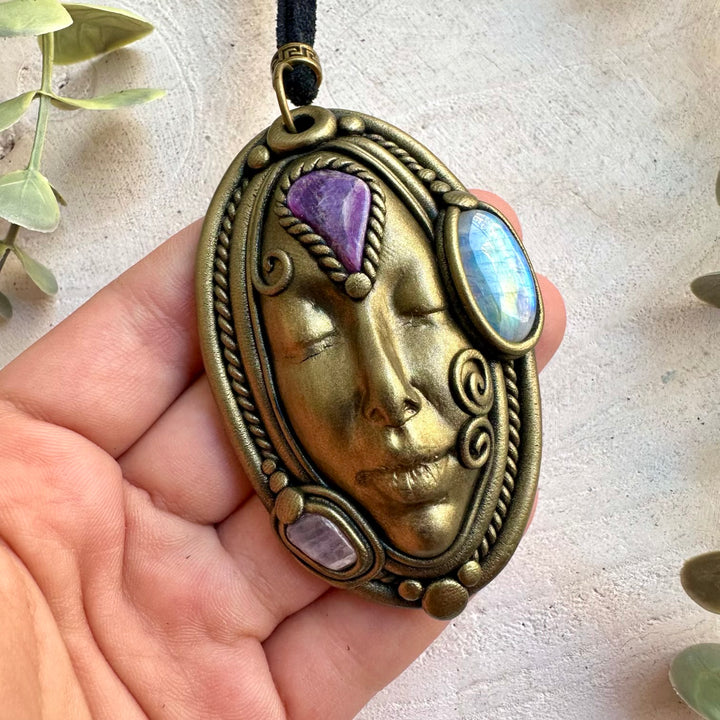 Handmade Rainbow Moonstone, Charoite and Kunzite Goddess necklace, a one of a kind metaphysical healing crystal jewelry piece combining iridescent Moonstone with rich purple Charoite and delicate pink Kunzite.
