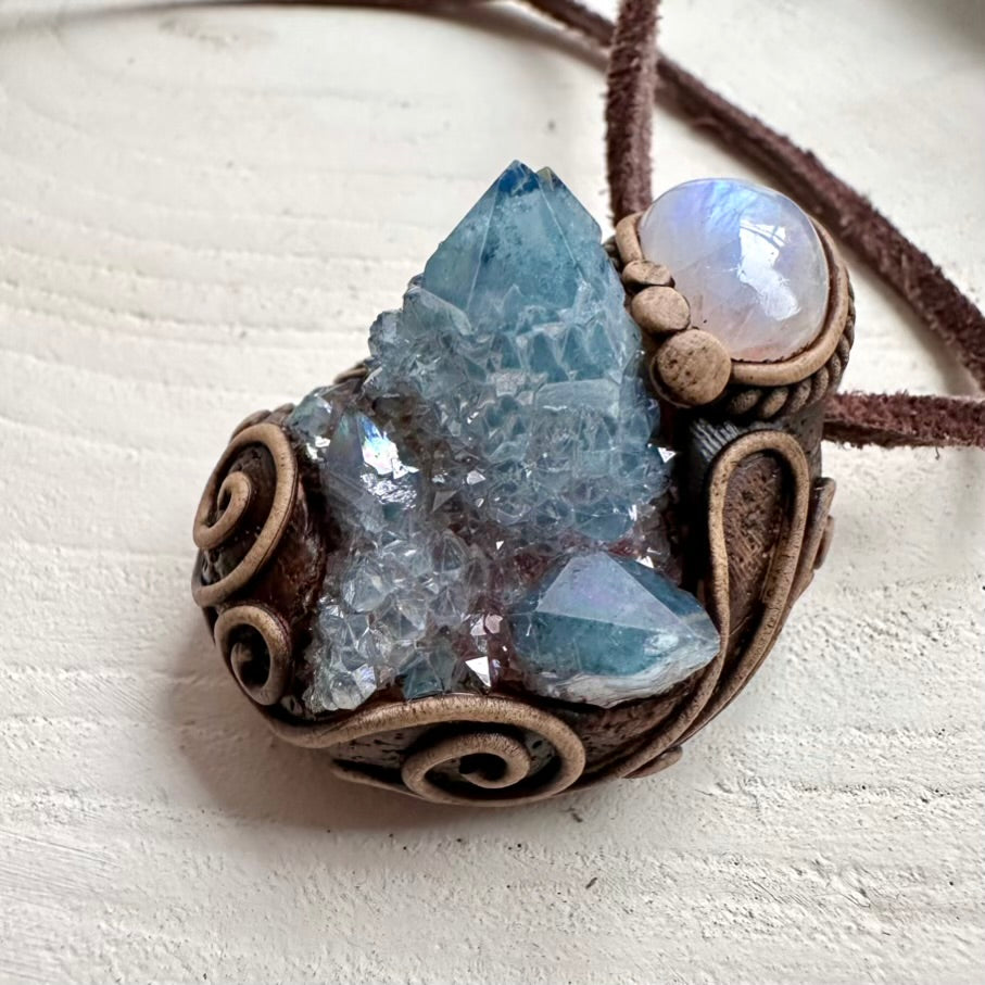 Raw crystal pendant with Aqua Aura Quartz cluster and Moonstone