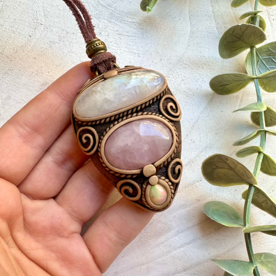 Handmade pendant necklace featuring rainbow moonstone rose quartz and opal