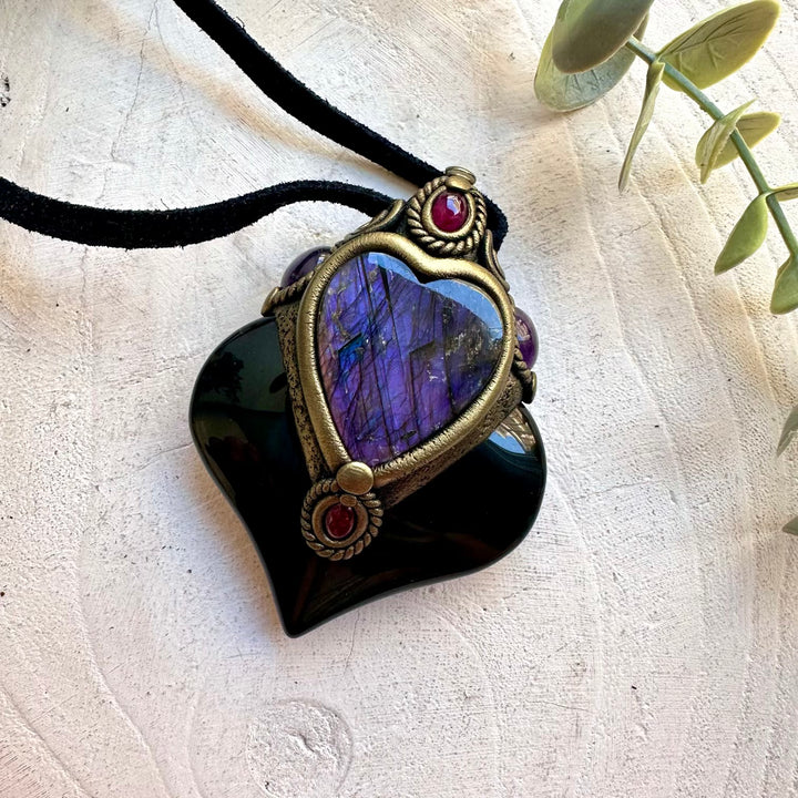 Healing crystal talisman featuring Rainbow Obsidian, Purple Labradorite, Amethyst and Rhodolite Garnet.