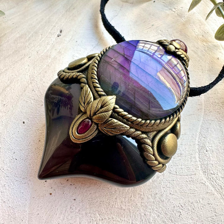 Handmade spiritual necklace featuring Rainbow Obsidian for protection and grounding.