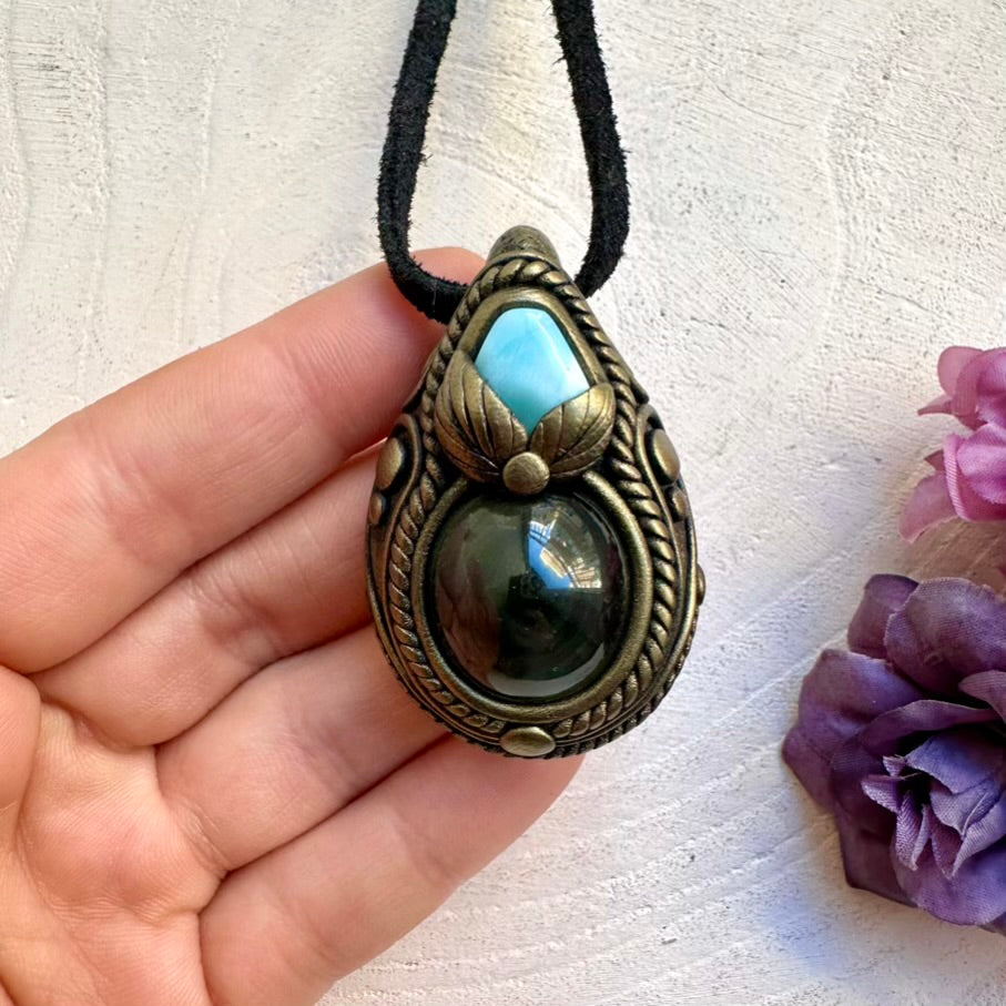 Handmade Rainbow Obsidian with luminous Larimar pendant necklace, calming and protective spiritual crystal jewelry talisman.