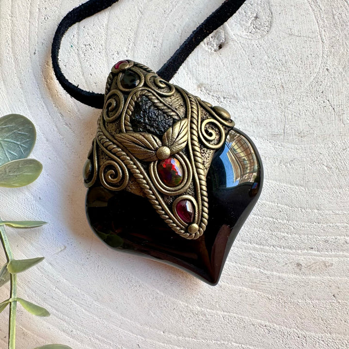 Crystal talisman with Rainbow Obsidian, Black Ethiopian Opal and colorful natural gemstone details.