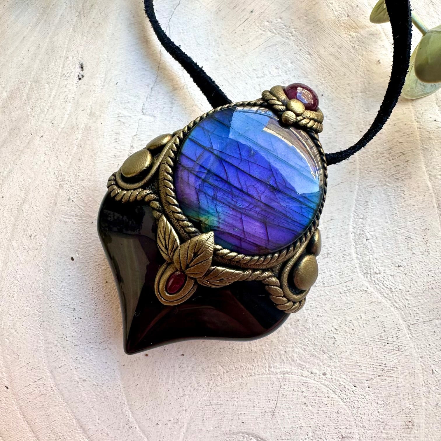 Crystal talisman necklace crafted with Rainbow Obsidian, Labradorite and vibrant Garnet gemstones.