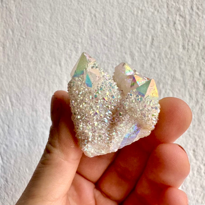 Rare Angel Aura Quartz crystal cluster with iridescent rainbow sheen
