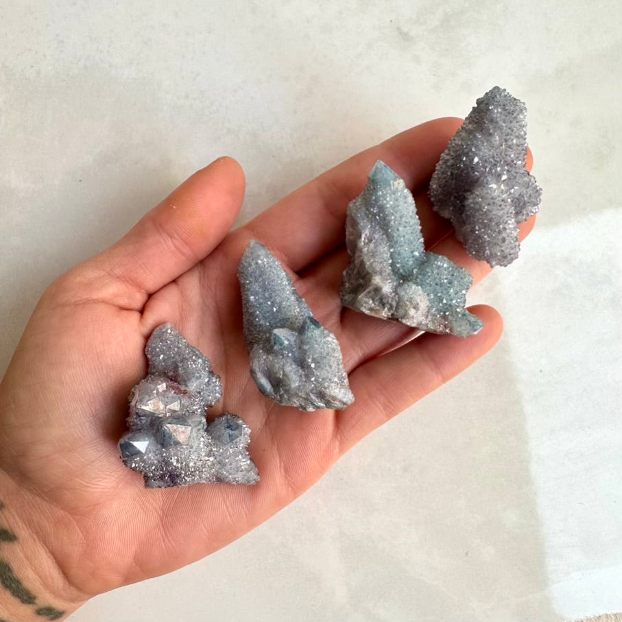 Rare Aqua Aura Quartz crystal cluster with iridescent blue tones