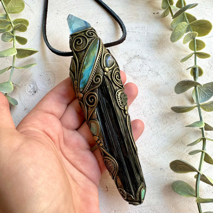 Handmade Long Raw Black Tourmaline healing crystal wand and talisman necklace featuring Aqua Aura Quartz, Labradorite, Raw Ethiopian Opal, Clear Topaz and Moldavite.