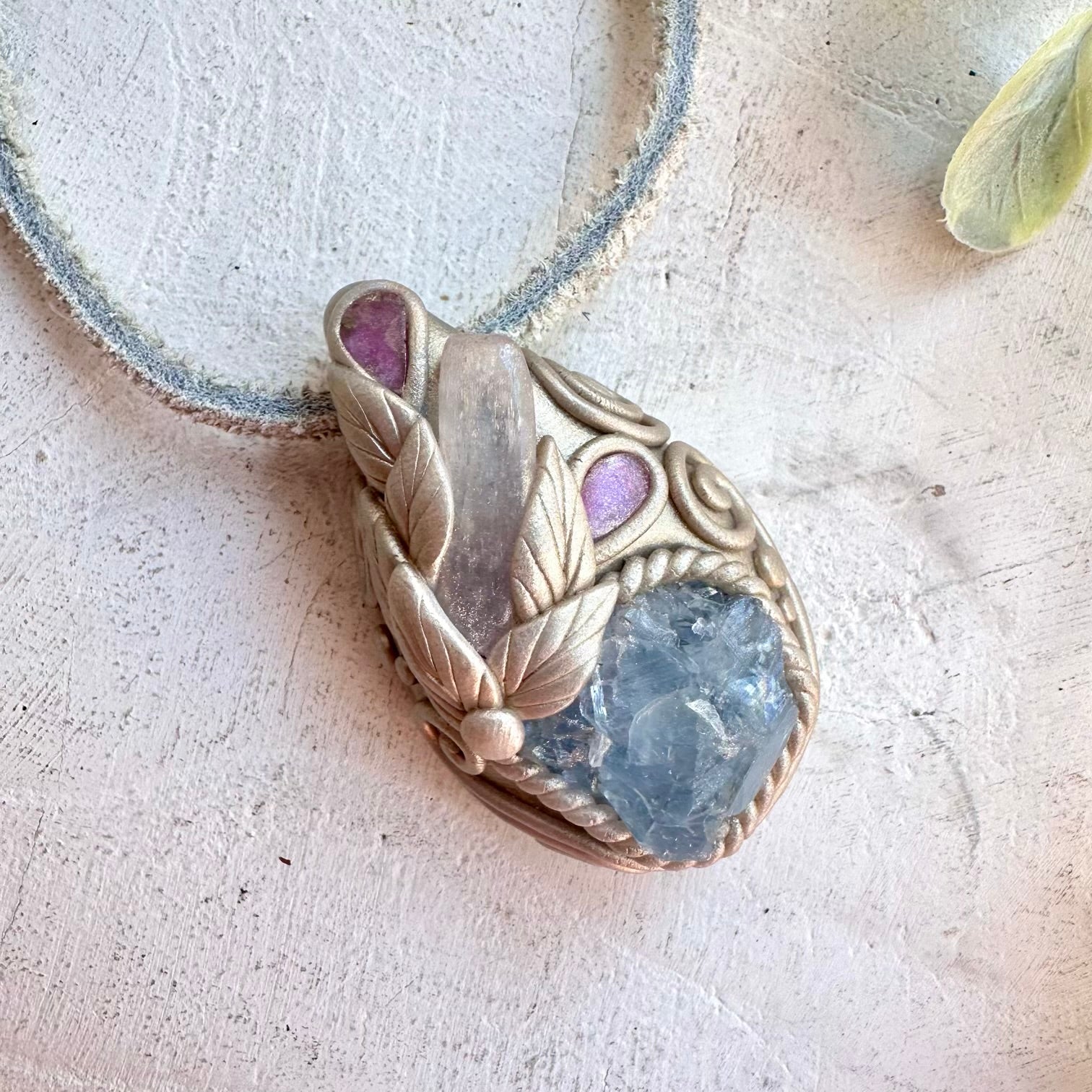 Crystal talisman necklace with raw celestite kunzite and pink tourmaline healing stones