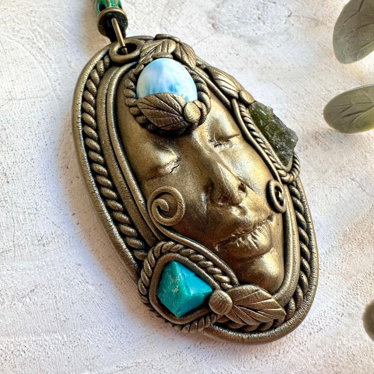 Protection goddess energy pendant showcasing a Larimar gemstone with Raw Chrysocolla and Moldavite accents.