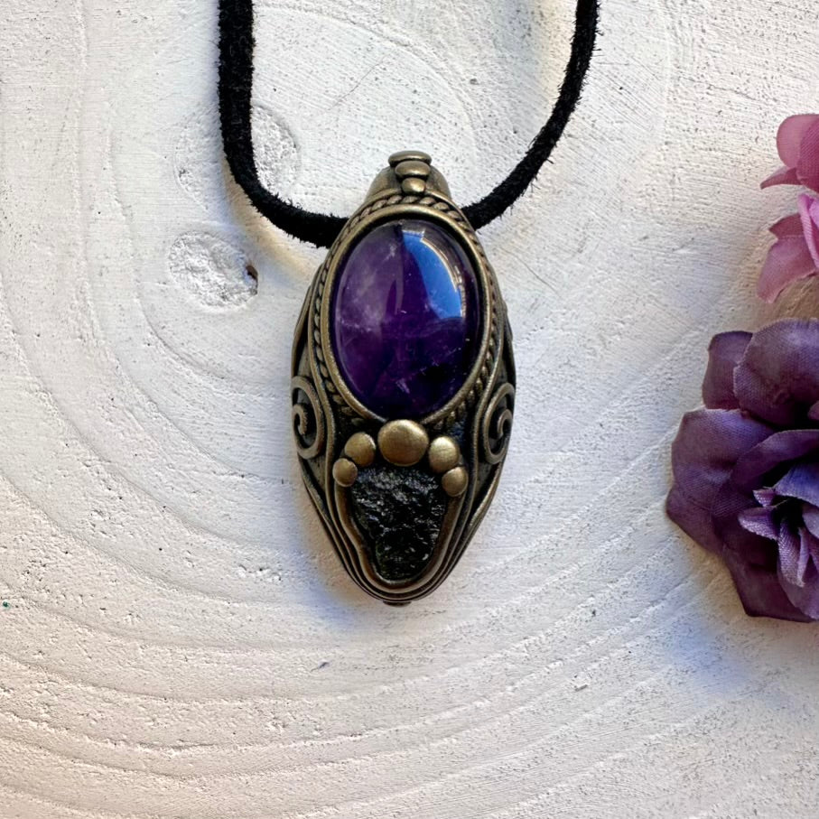 Protective raw green Moldavite crystal with soothing Amethyst energy, artisan handmade spiritual amulet necklace tool.