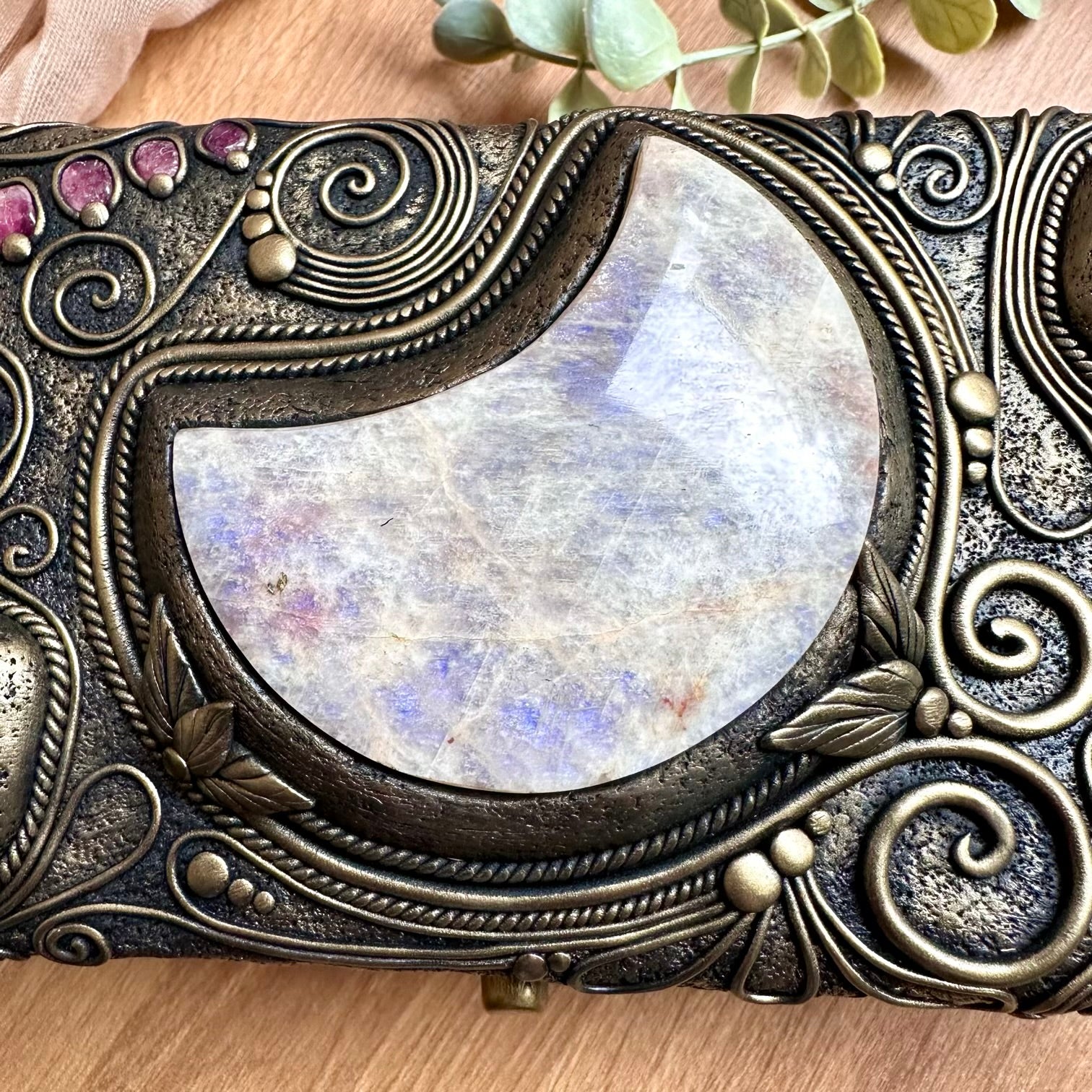 Raw Ethiopian opal displayed in a handmade crystal box for creativity and spiritual inspiration