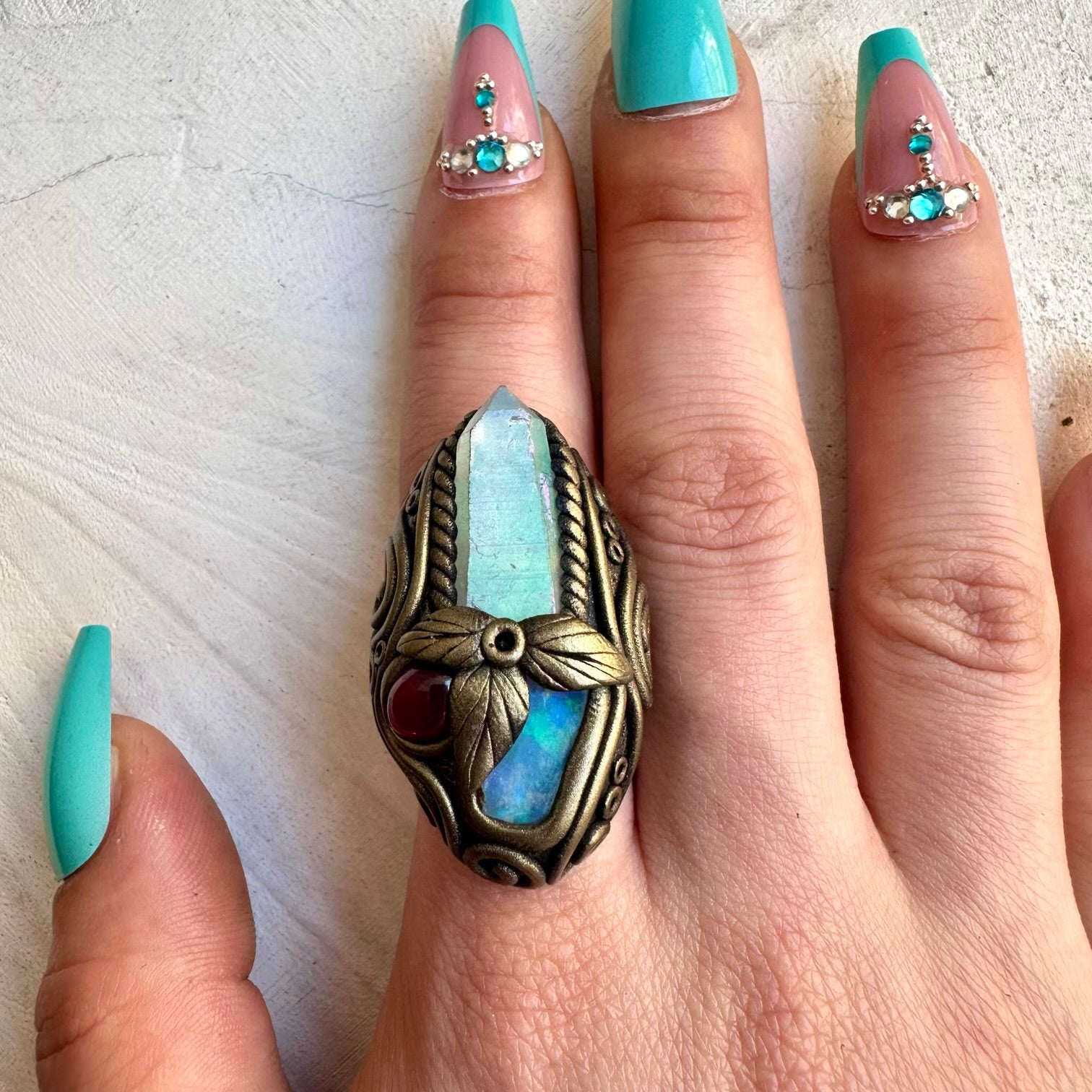 Handmade ring with angel aura quartz and Ethiopian opal