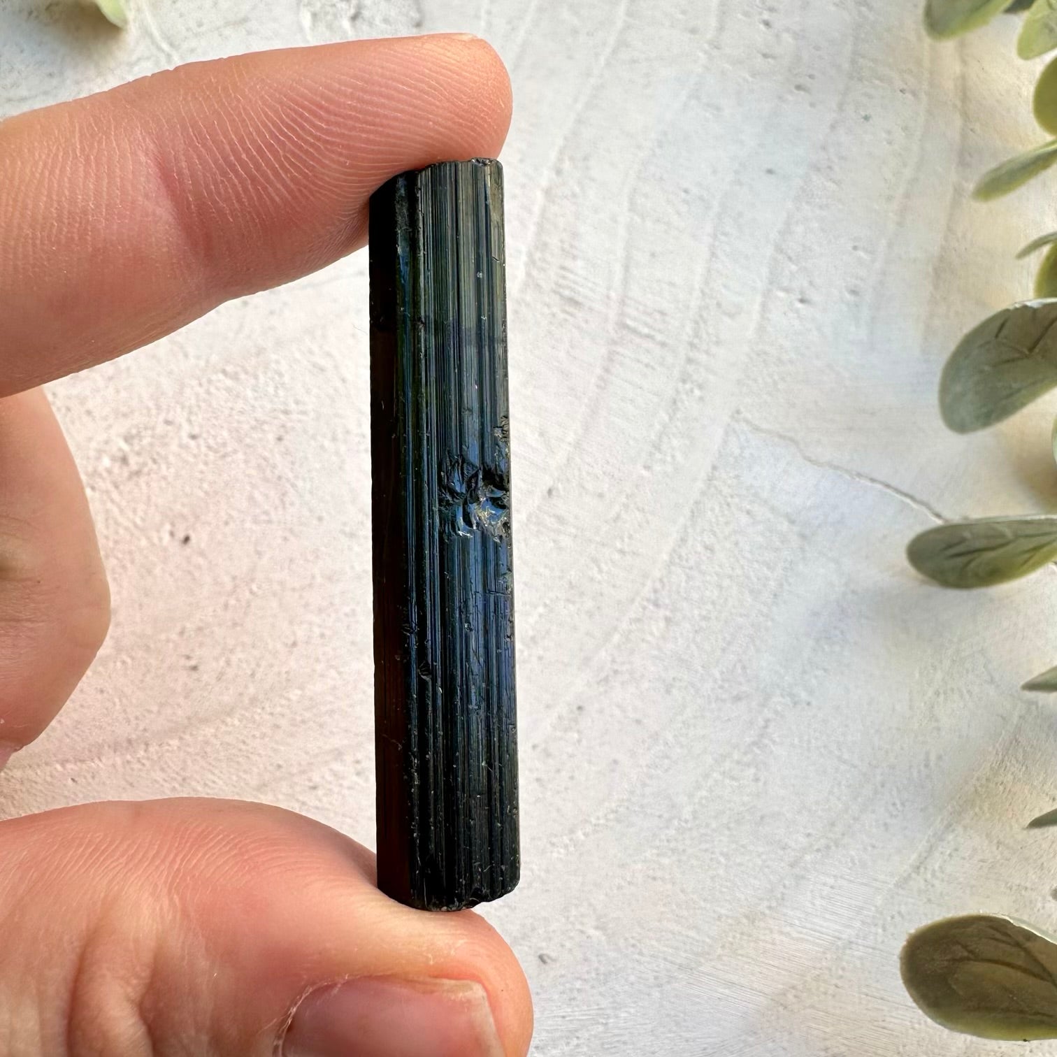 Close up of natural green tourmaline crystal
