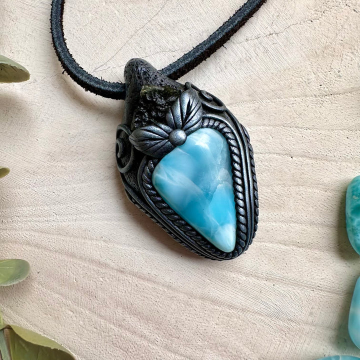 Healing crystal pendant with larimar and moldavite