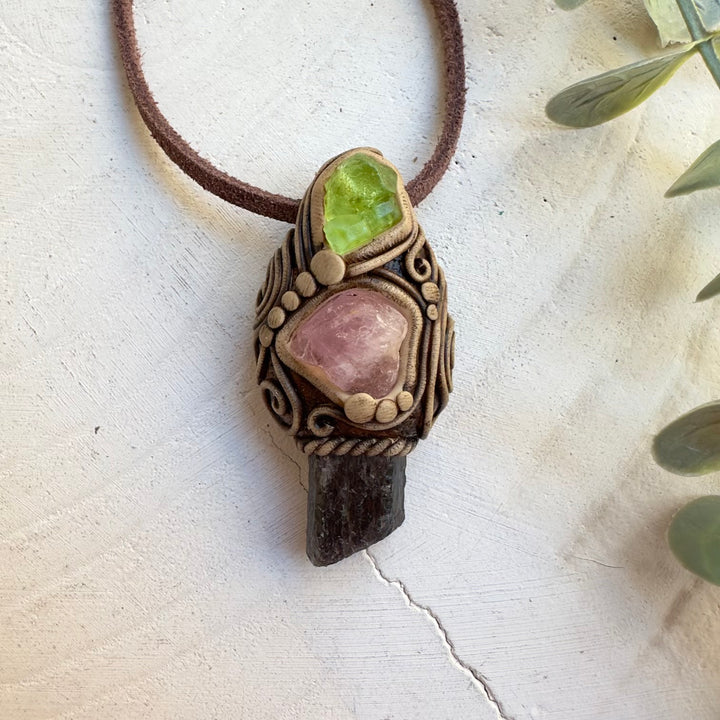 Handmade gemstone necklace featuring raw morganite and peridot
