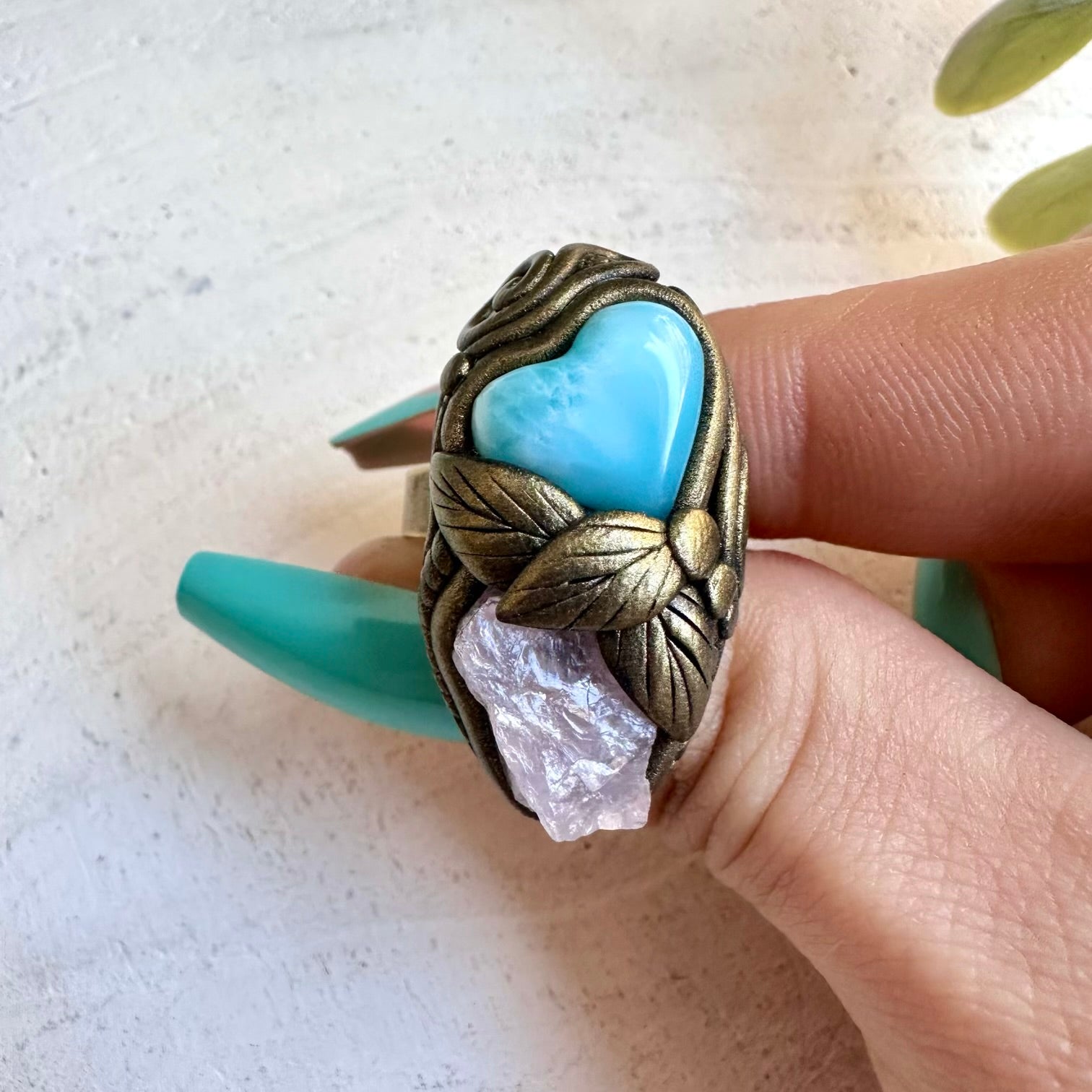 Spiritual jewelry ring combining larimar and rose quartz