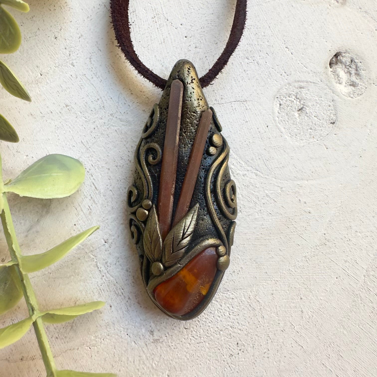 Baltic Amber pendant necklace with Red Quartz crystal