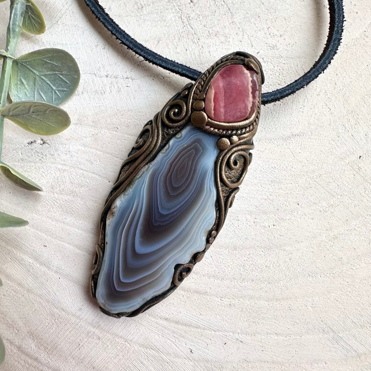 Rhodochrosite crystal pendant necklace for spiritual jewelry lovers and healing gemstone collectors