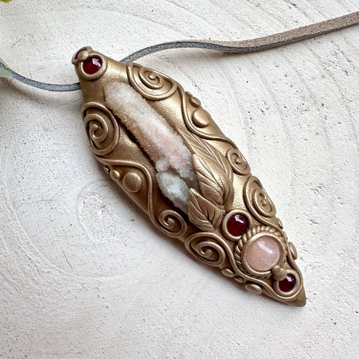 Fairy quartz paired with morganite and garnet in a necklace