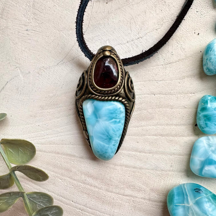 Larimar paired with rhodolite garnet in a necklace